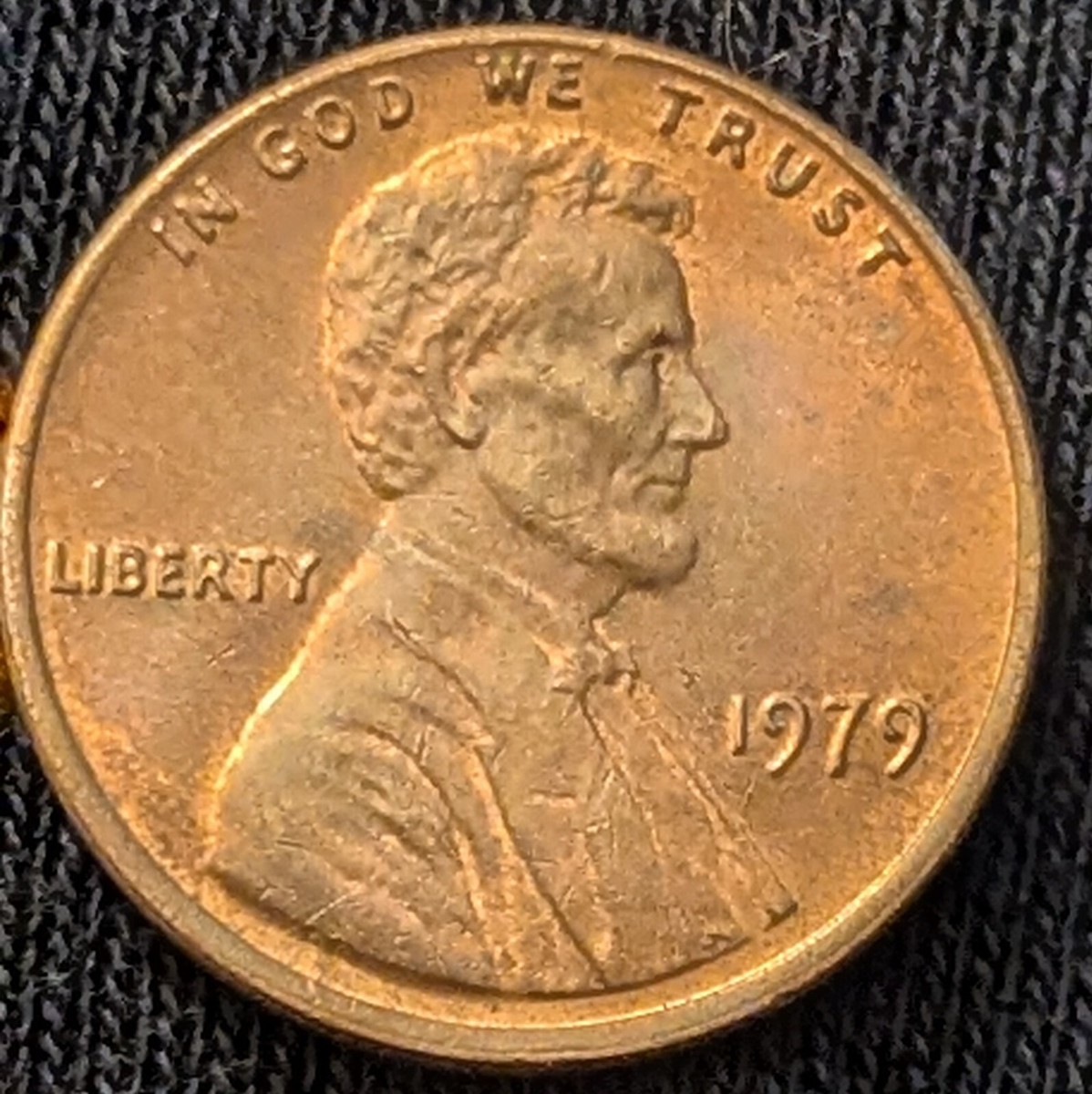 1979 penny off-center strike error showing blank crescent and shifted Lincoln design