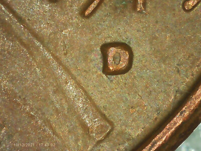 1979-D penny repunched mint mark (RPM) error showing secondary D impression offset from primary D
